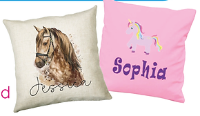Two personalized cushions, one with a photo of a horse and the name 'Jessica' printed below it, and another with a whimsical illustration of a cat face with the name 'Sophia' below it.